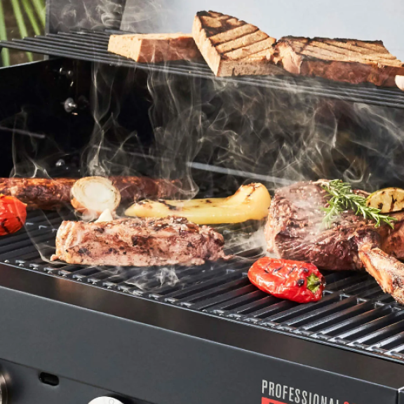 Char-Broil Professional Series stainless steel gas grill cooking steaks evenly